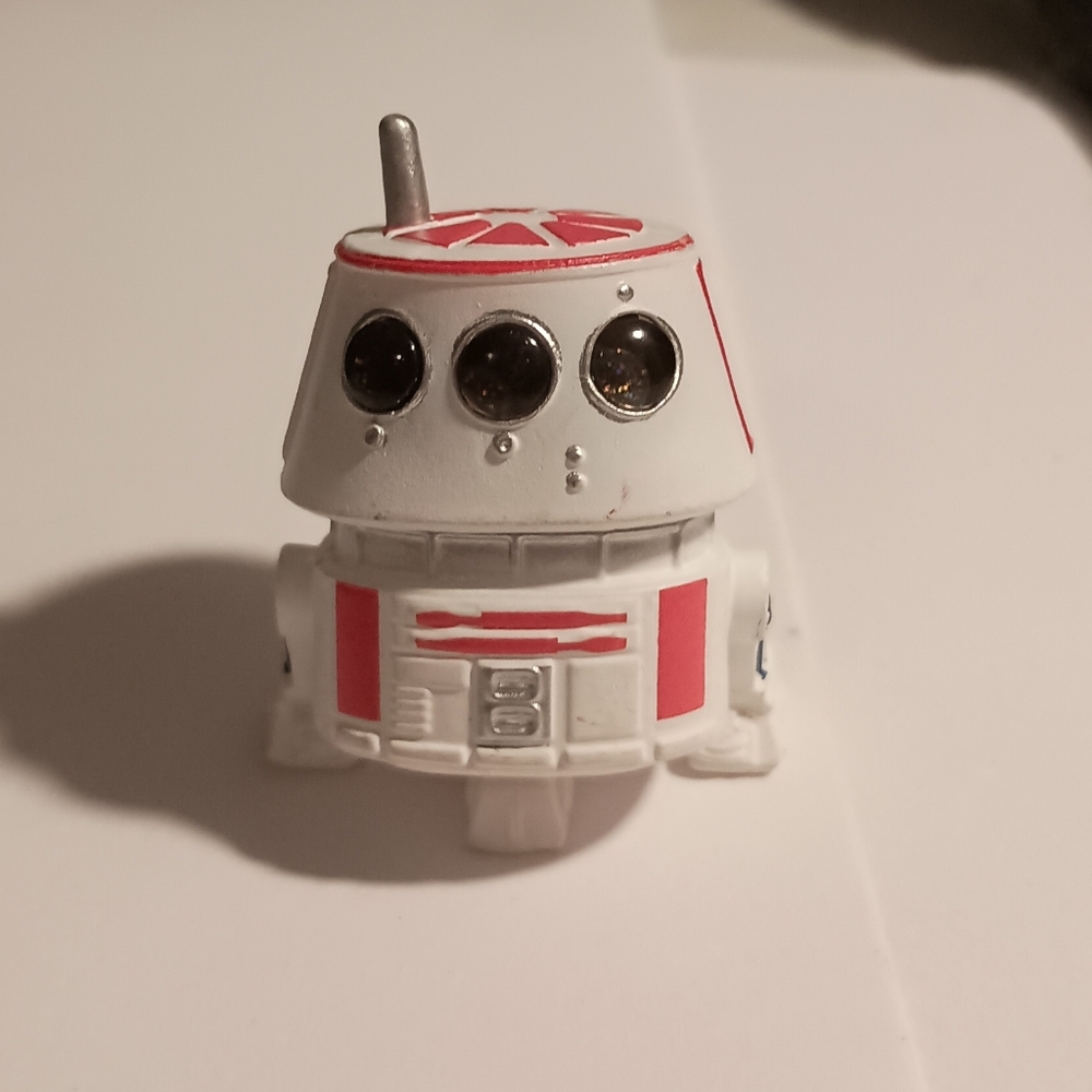 White and Red Robot Figure